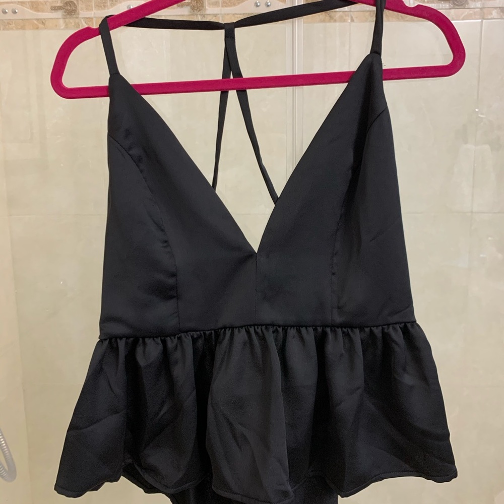 Black open back peplum top